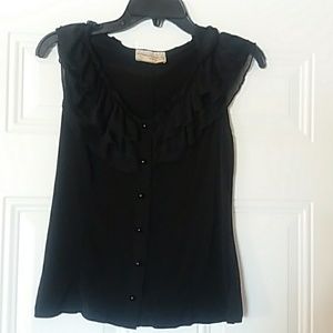 Carrie Allen. Sleeveless top button front